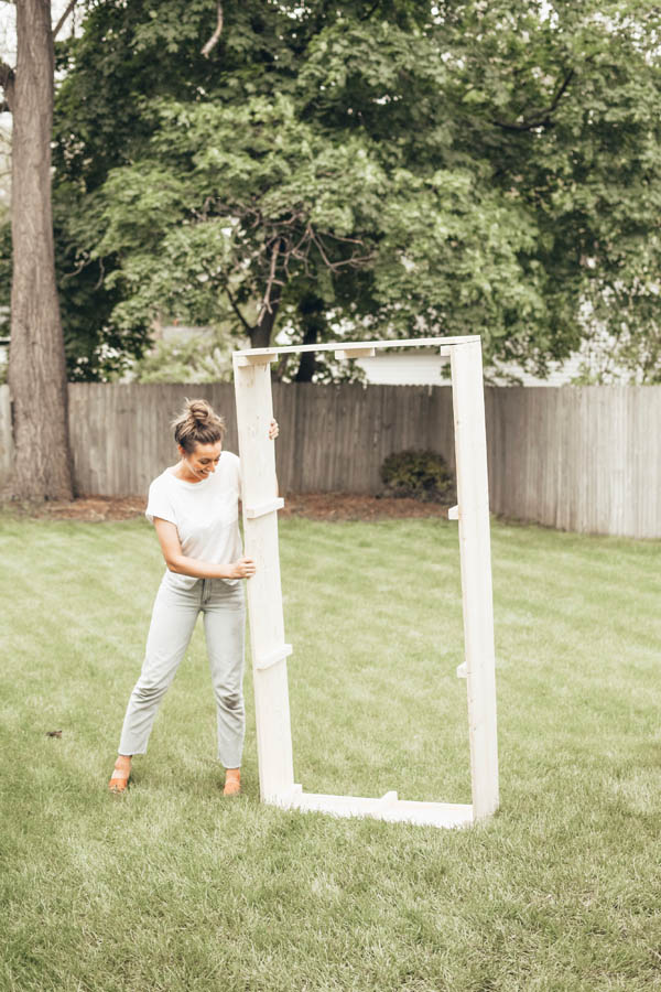 Girl holding a raised garden bed