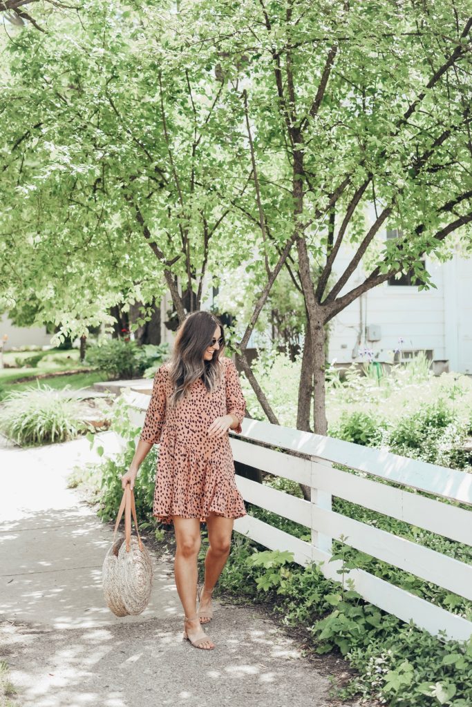 Girl in pink dress in neighborhood