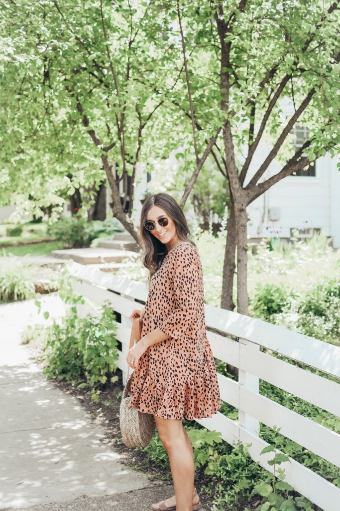 Girl in pink dress in neighborhood