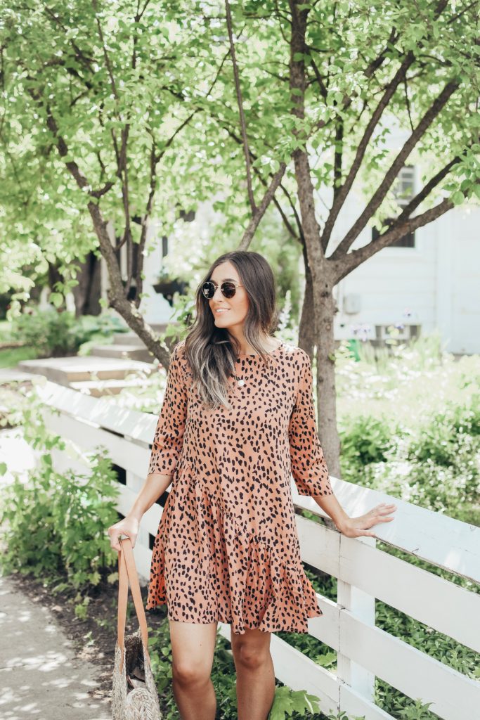 Girl in pink dress in neighborhood