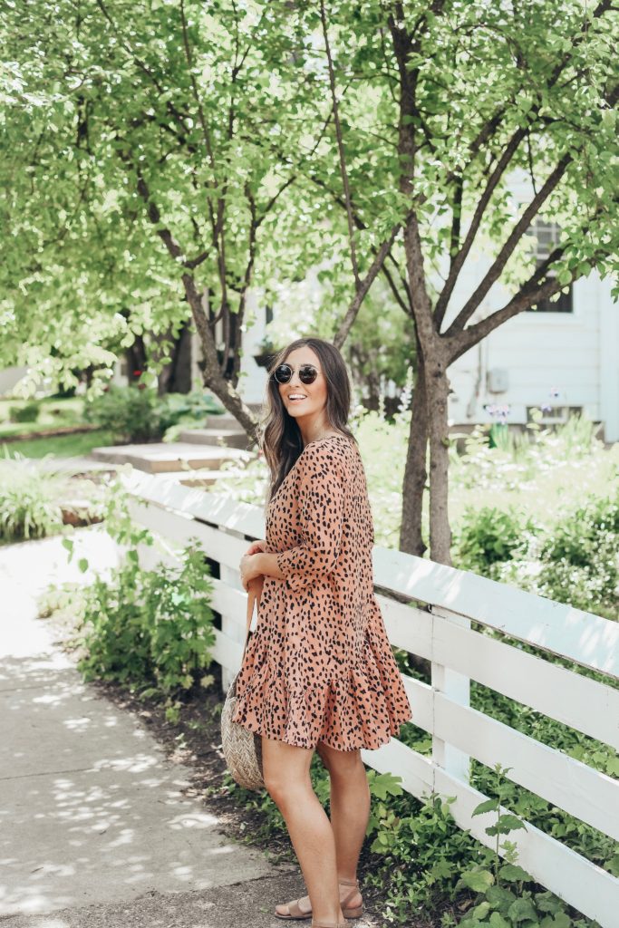 Girl in pink dress in neighborhood