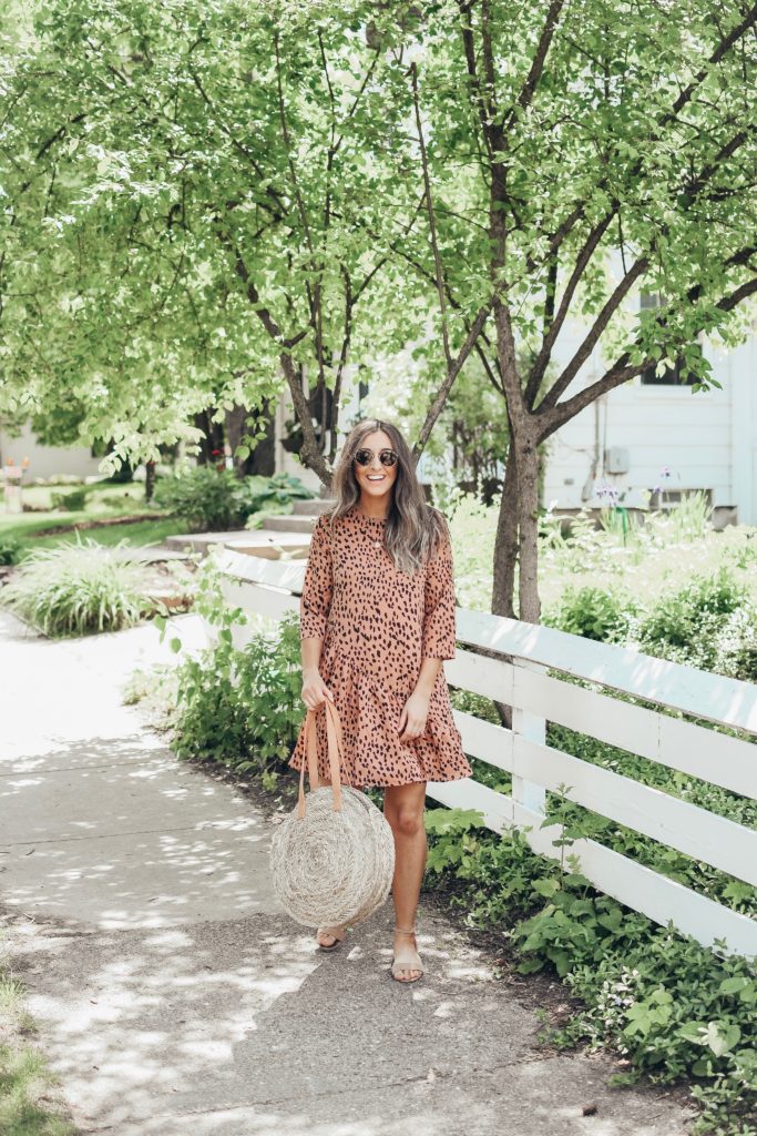 Girl in pink dress in neighborhood