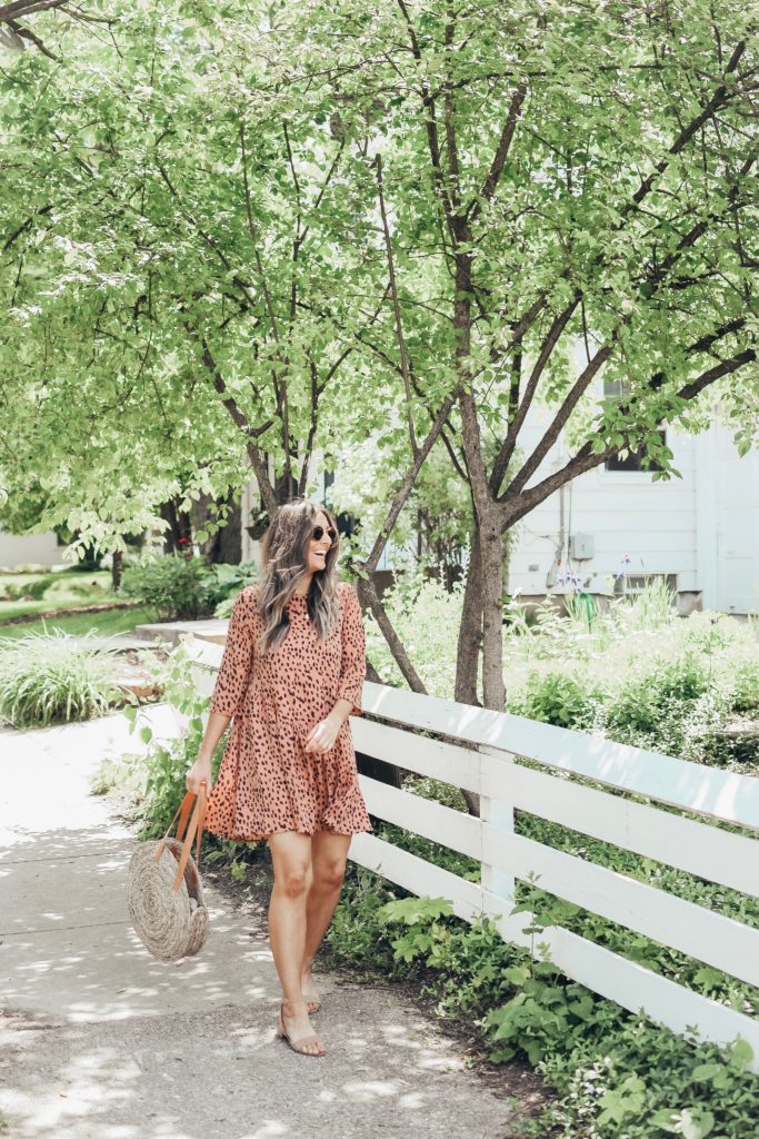 Girl in pink dress in neighborhood