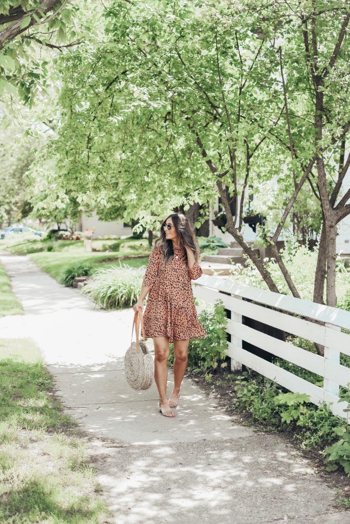 Girl in pink dress in neighborhood