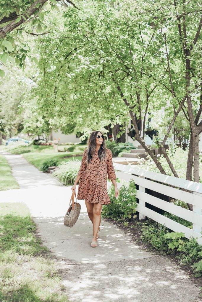 Girl in pink dress in neighborhood