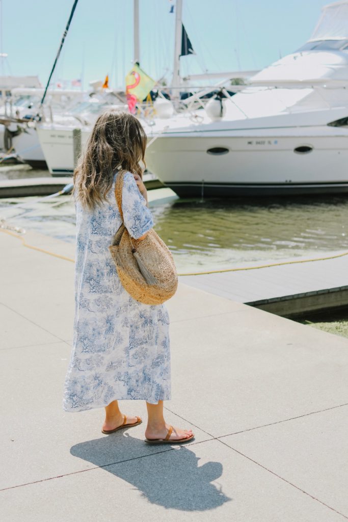 Girl By Boats