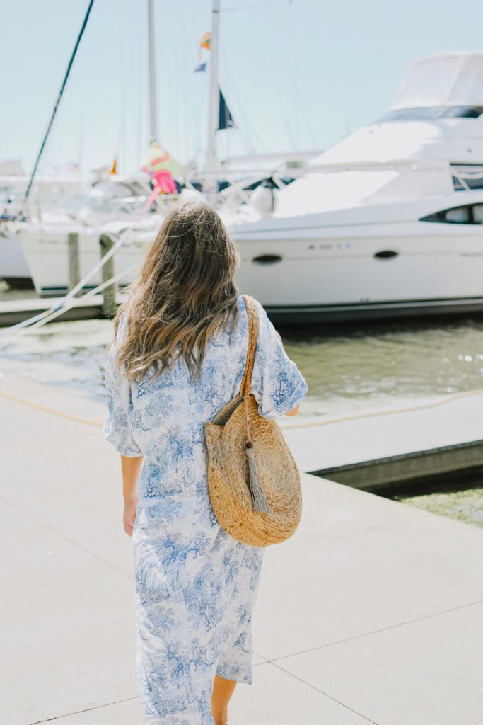 Girl By Boats