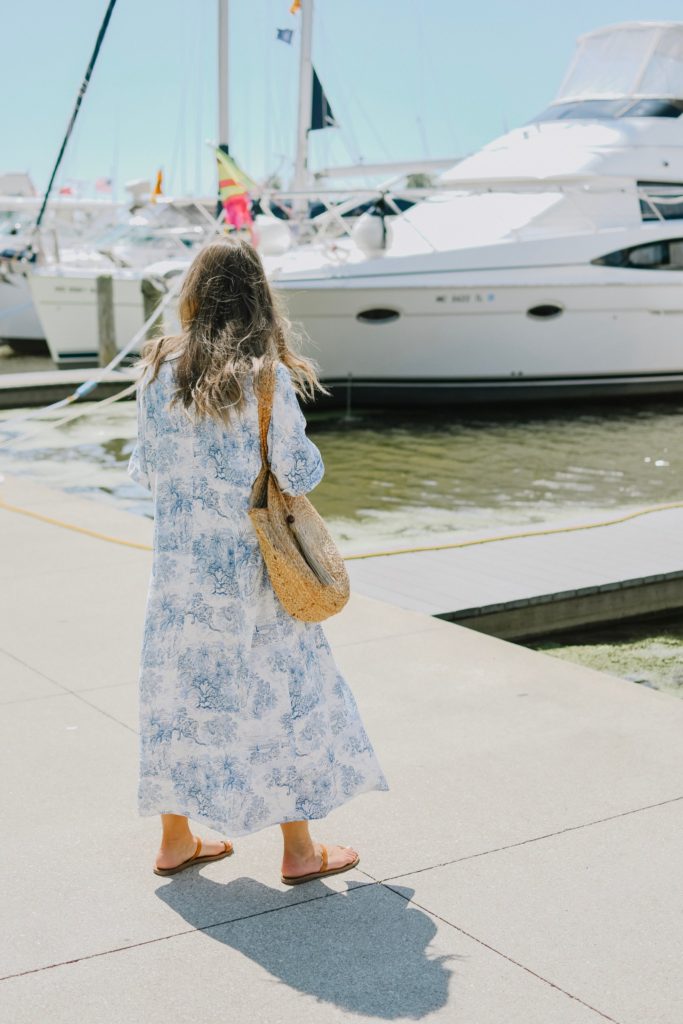 Girl By Boats