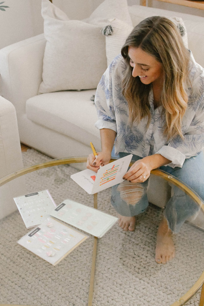 Girl writing in card